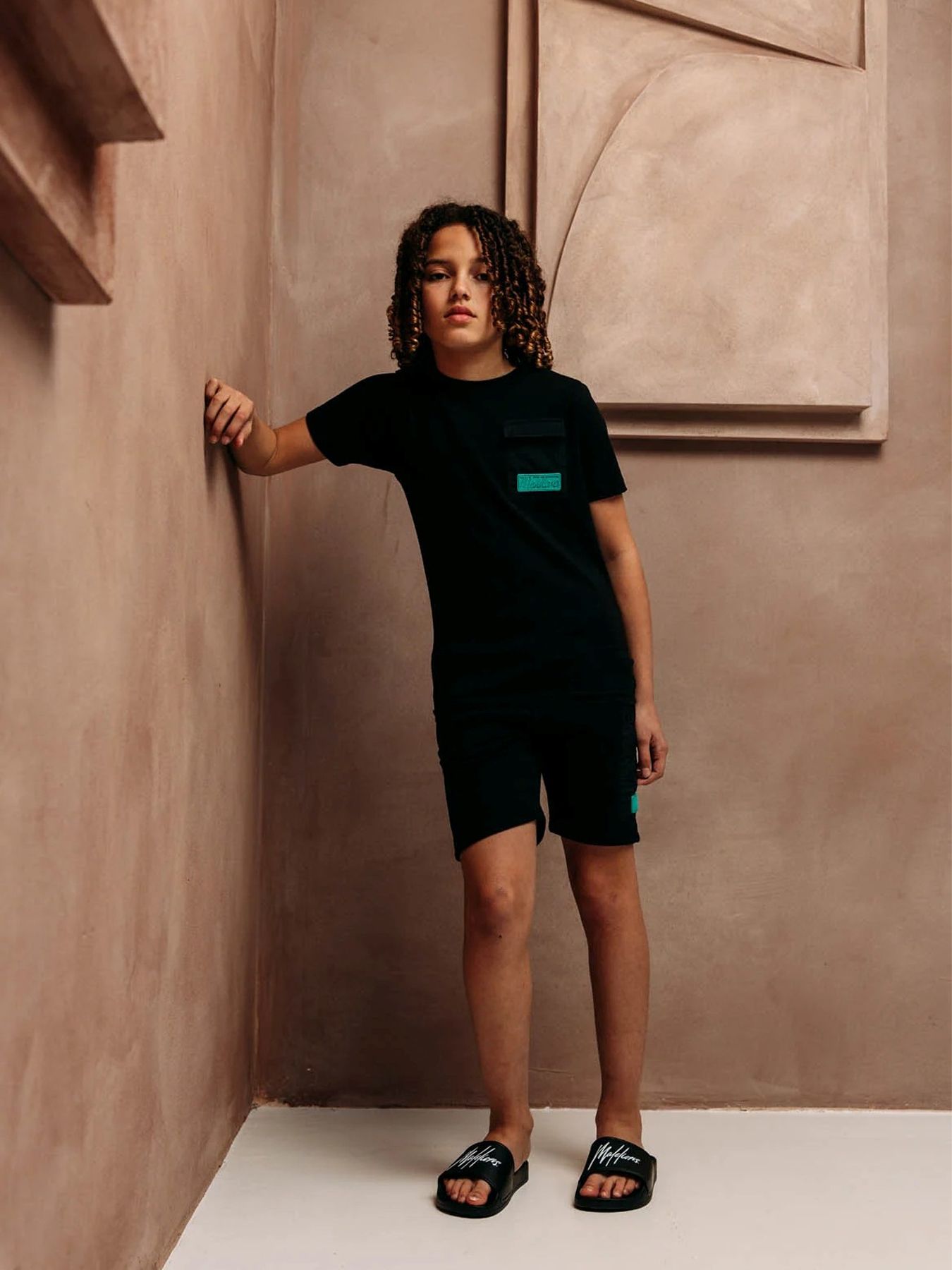 Malelions Junior nylon pocket t-shi Black/Turquoise 2900156962031