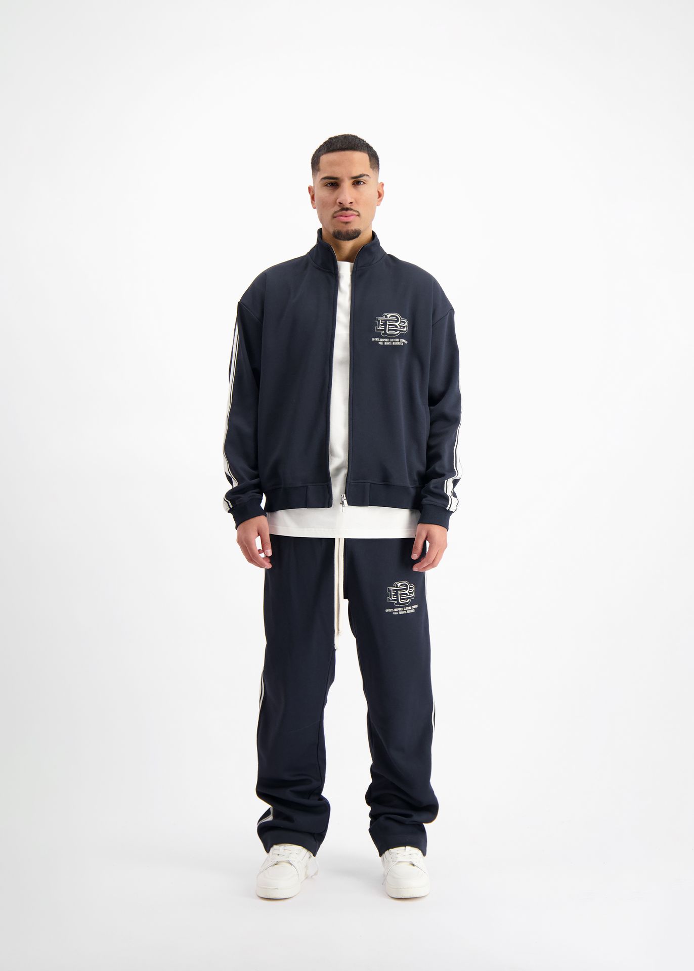 Black Bananas Monogram trackpants Navy 2900159006060 Black Bananas Monogram trackpants Navy 2900159006060